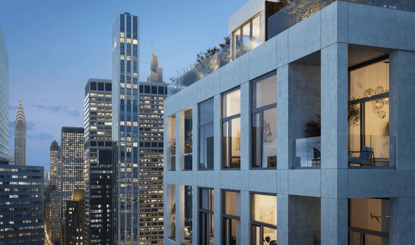 Malabar Residences — Building exterior — upper floors at dusk with Midtown skyline